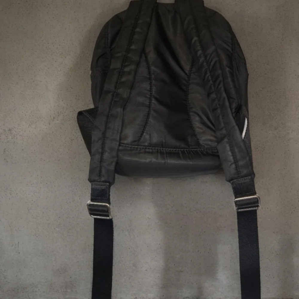 Lacoste Black Mini-Backpack‎